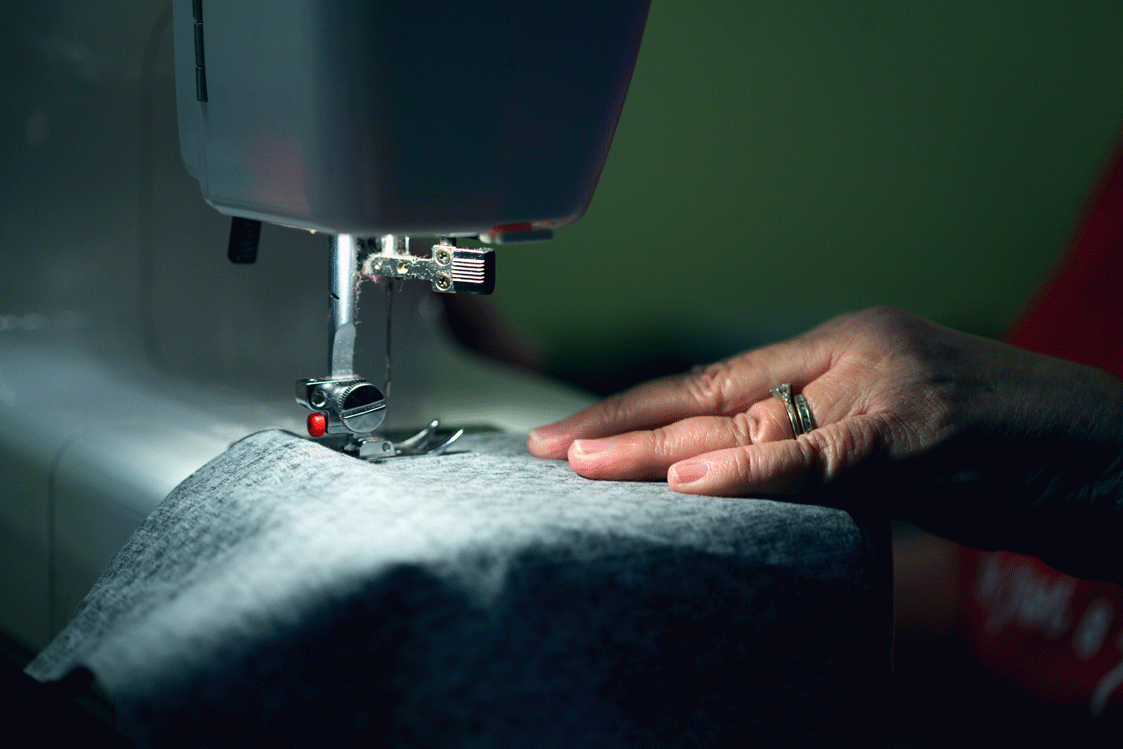 Person-Sewing-in-Grayv2